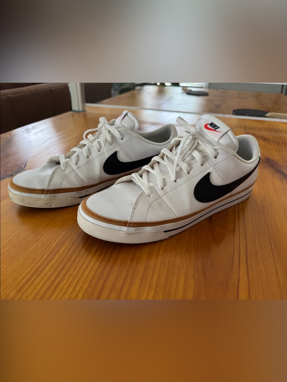 Nike White Leather Sneakers with Black Swoosh and Tan Trim